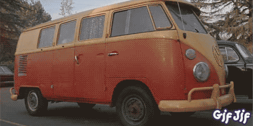 A Red And Yellow Van Is Parked In A Parking Lot With The Words Gif Jif On The Bottom GIF