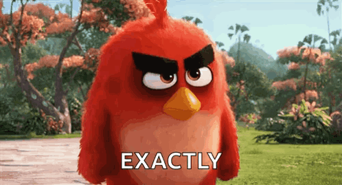 A Red Angry Bird From The Angry Birds Movie Is Standing In A Grassy Field . GIF