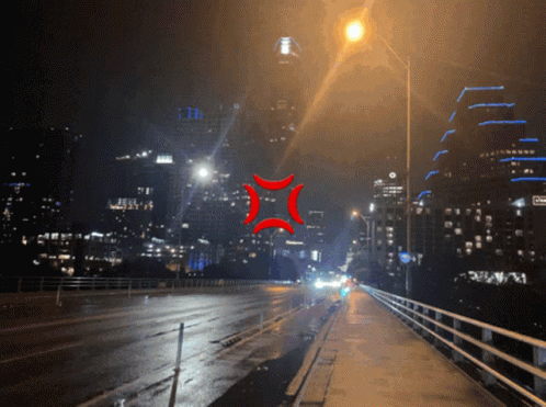 Red Angry Face On Night Street GIF