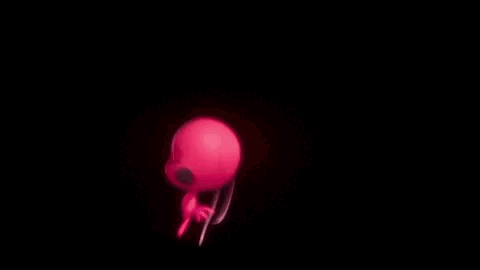 A Red Ant And A Black Cat Are Standing Next To Each Other In The Dark . GIF