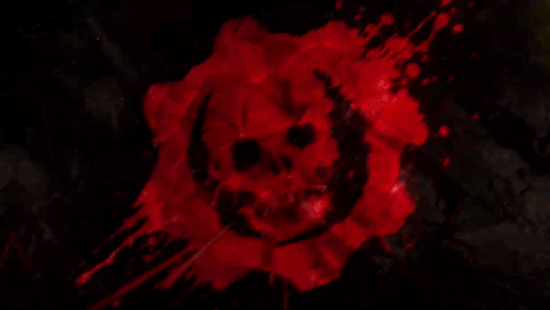 A Red Background With A Skull In The Middle Of It GIF
