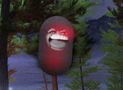 A Red Balloon With A Face On It Is Hanging From A Tree GIF