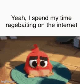 A Red Bird From The Angry Birds Movie Is Sitting On A Blue Mat . GIF