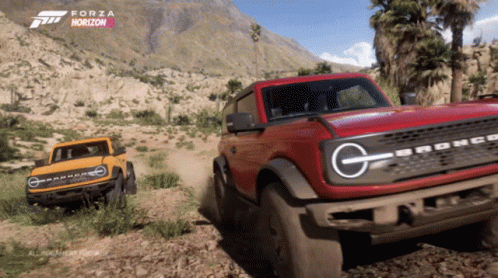 A Red Bronco Is Driving Down A Dirt Road In A Video Game Called Forza Horizon 5 GIF
