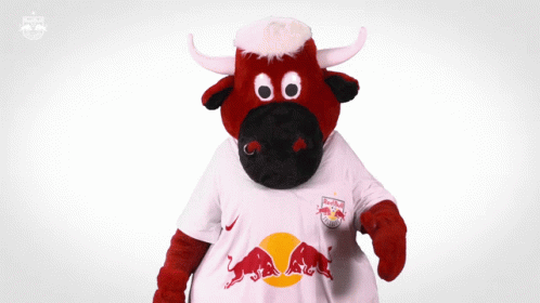 A Red Bull Mascot Is Wearing A White Shirt That Says Red Bull GIF