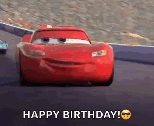 A Red Car From The Movie Cars Is Driving Down A Race Track And Says Happy Birthday . GIF