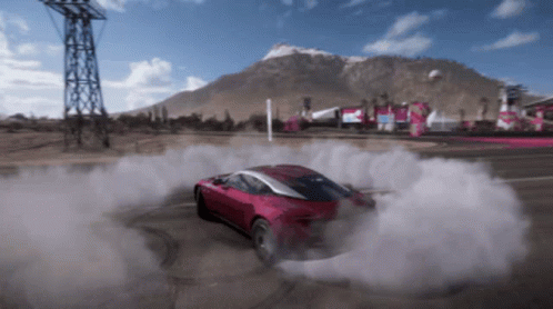 A Red Car Is Drifting On A Road With Smoke Coming Out Of The Tires GIF