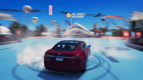 A Red Car Is Driving On A Track That Says Hot Wheels Autoshow On The Bottom GIF