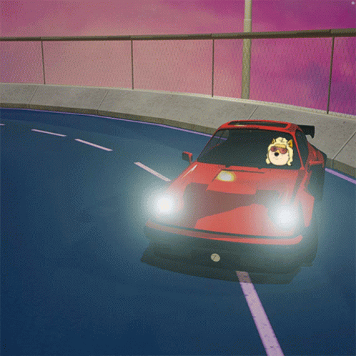 A Red Car With A Hedgehog In The Driver 'S Seat Driving Down A Road GIF
