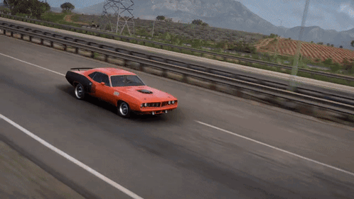 A Red Car With A Hood That Has The Letter S On It GIF