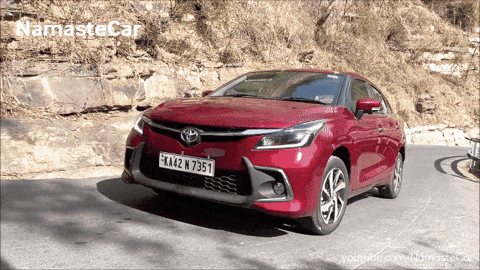 A Red Car With A License Plate That Says Fk402 N7351 GIF