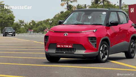 A Red Car With A License Plate That Says Mh 14 Tcm281 GIF