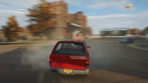 A Red Car With A License Plate That Says ' Nc ' On It GIF