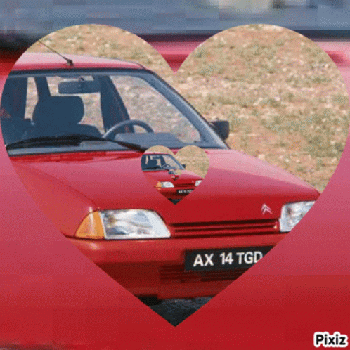 A Red Car With Ax 14 Tgd On The License Plate GIF