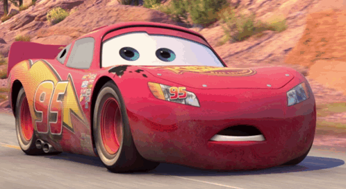 A Red Car With The Number 95 On The Front Of It GIF