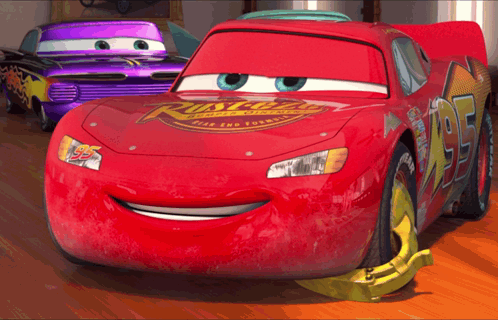A Red Car With The Number 95 On The Side GIF