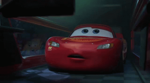 A Red Cartoon Car With The Number 55 On The Side Of It GIF
