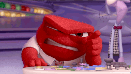 A Red Cartoon Character Is Sitting At A Table With A Puzzle On It . GIF
