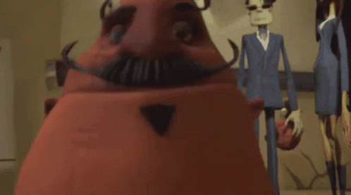 A Red Cartoon Character With A Mustache And A Triangle Nose GIF