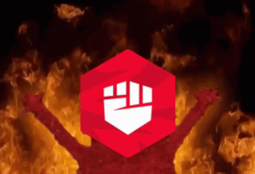 A Red Cube With A Fist Inside Of It Is Surrounded By Flames GIF