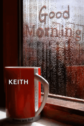 A Red Cup With The Name Keith On It Sits In Front Of A Window GIF