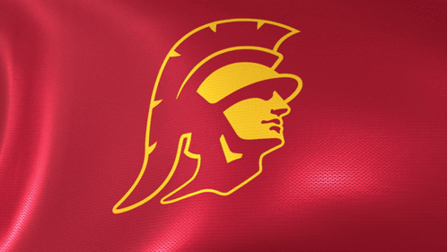 A Red Flag With A Yellow Logo Of A Spartan On It GIF