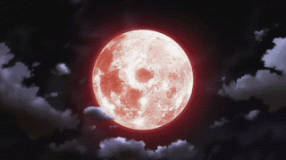 A Red Full Moon Is Surrounded By Clouds In The Night Sky GIF