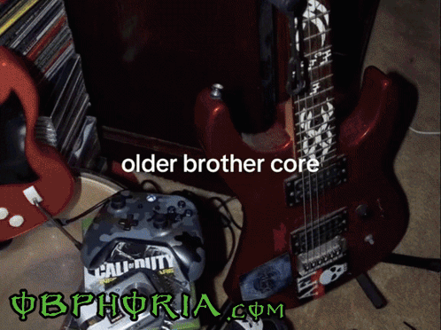 Red Guitar With Older Brother Core Text GIF