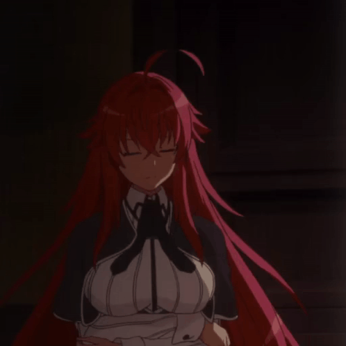 A Red Haired Anime Girl With Her Eyes Closed In The Dark GIF