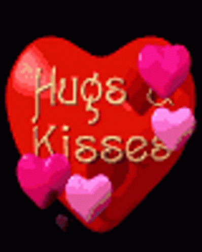 A Red Heart With The Words Hugs & Kisses Written On It GIF