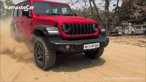 A Red Jeep With The License Plate Mh12wp8240 GIF