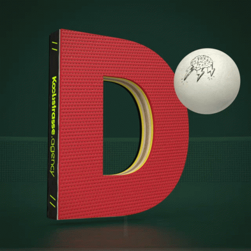 A Red Letter D With A Ping Pong Ball On Top GIF