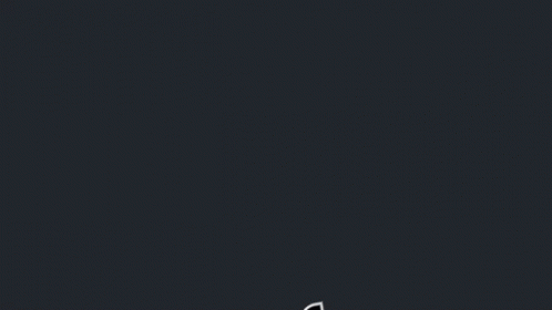 A Red Letter M Is On A Dark Background GIF