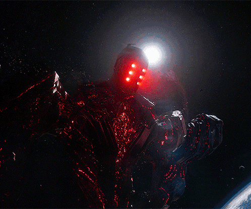 A Red Light Coming Out Of A Black Hole In Space GIF