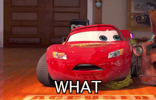 A Red Lightning Mcqueen From The Movie Cars Is Sitting On The Floor GIF