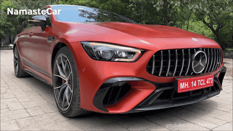 A Red Mercedes With A License Plate That Says Mh.14 Tcl 473 GIF