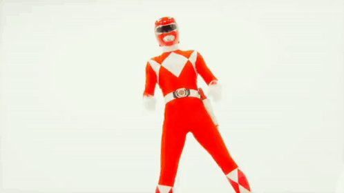 A Red Power Ranger Is Holding A Red Sword GIF