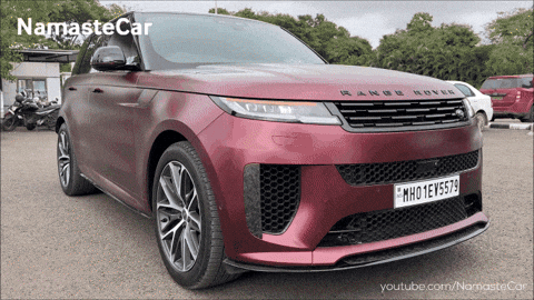 A Red Range Rover With The License Plate Mh01ey579 GIF