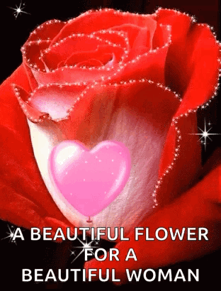 A Red Rose With A Pink Heart Inside Of It And The Words `` A Beautiful Flower For A Beautiful Woman '' GIF