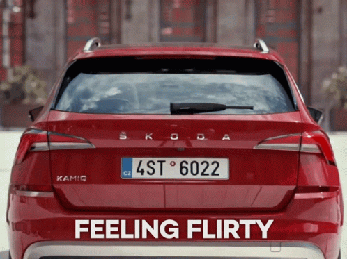 A Red Skoda With A License Plate That Says 4St6022 GIF
