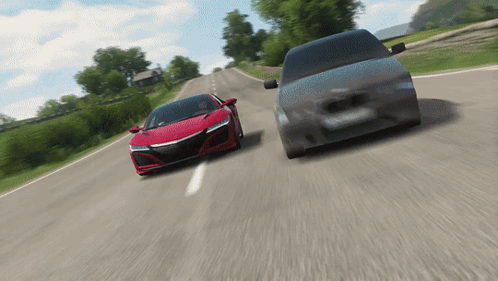 A Red Sports Car And A Black Van Are Driving Down A Road GIF