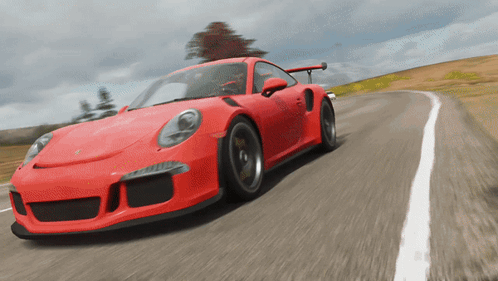 A Red Sports Car Is Driving Down A Road In A Video Game GIF