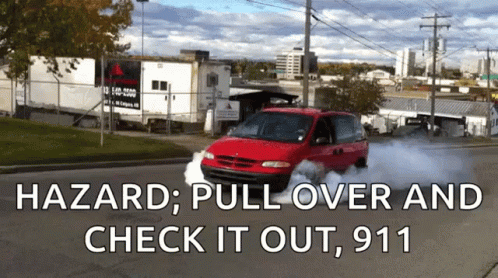 A Red Van Is Driving Down A Street With Smoke Coming Out Of It And The Words " Hazard Pull Over And Check It Out 911 " GIF