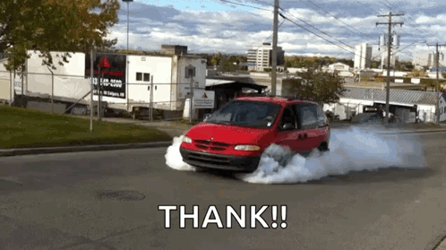 A Red Van Is Driving Down A Street With Smoke Coming Out Of Its Tires And The Words Thank Written On The Bottom GIF