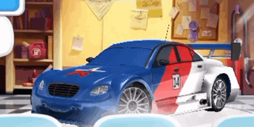 A Red White And Blue Race Car With The Number 14 On The Side GIF