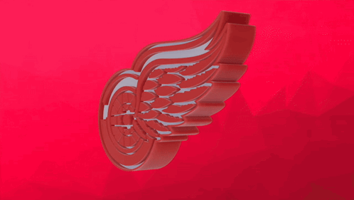 A Red Wing With A Wheel In The Middle Is On A Red Background GIF