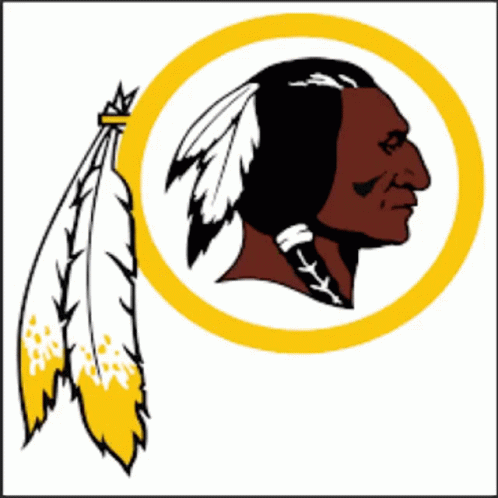 A Redskins Logo With A Feather In His Hair And A Yellow Smiley Face GIF