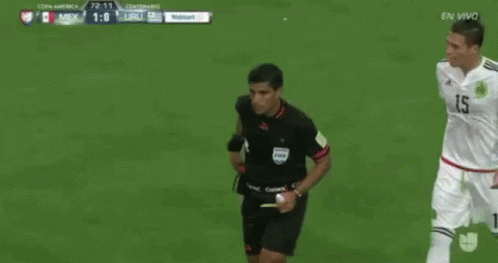 A Referee Gives A Red Card To A Soccer Player GIF