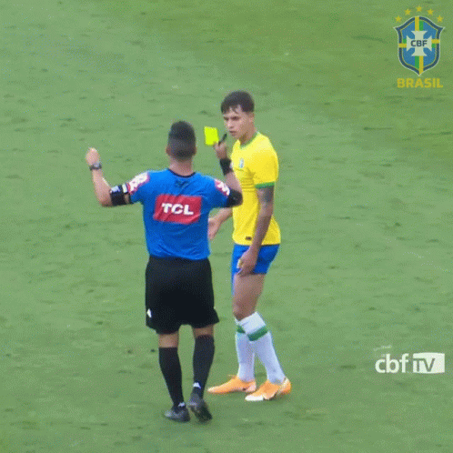 A Referee Giving A Yellow Card To A Soccer Player With A Tcl Logo On His Shirt GIF