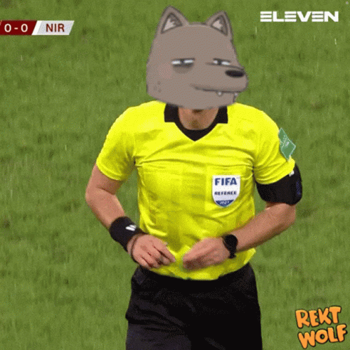 A Referee Wearing A Yellow Shirt With Fifa On The Front GIF